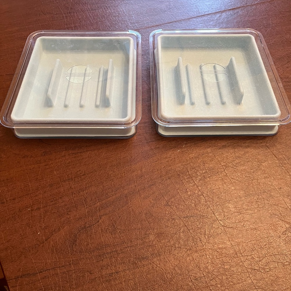 Neatnix watch/bracelet holders. Lightly used. Sold as pair
